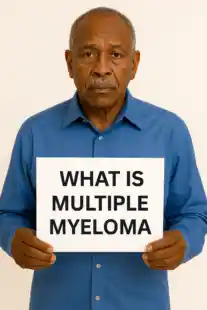 What Is Multiple Myeloma? Sign being held by a 65 year old Black Man